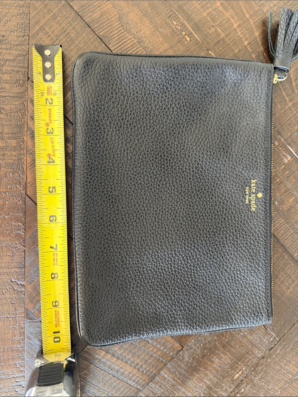 kate spade Black Pebbled Leather Travel Pouch with Tassel